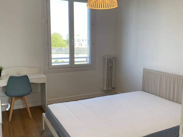 Location / Appartement 4 pièces de 63 m², Saint-Jacques-de-la-Lande, Rue de la Pilate / Photo 2