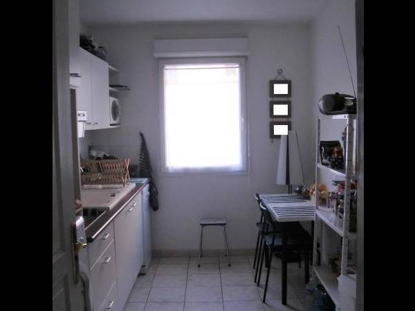 Location / Appartement 3 pièces de 77 m², Nîmes, Rue Notre Dame / Photo 2