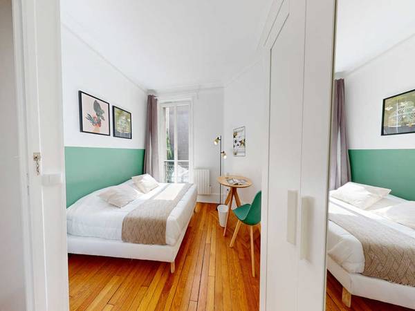 Colocation / Appartement 3 pièces de 50 m², Paris, Rue des Cloys / Photo 2