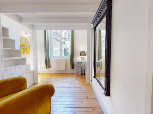 Colocation / Appartement 4 pièces de 101 m², Saint-Étienne, Rue du Théâtre / Photo 2