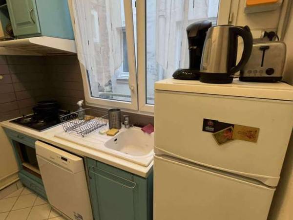 Colocation / Appartement 3 pièces de 60 m², Paris, Rue Leneveux / Photo 2