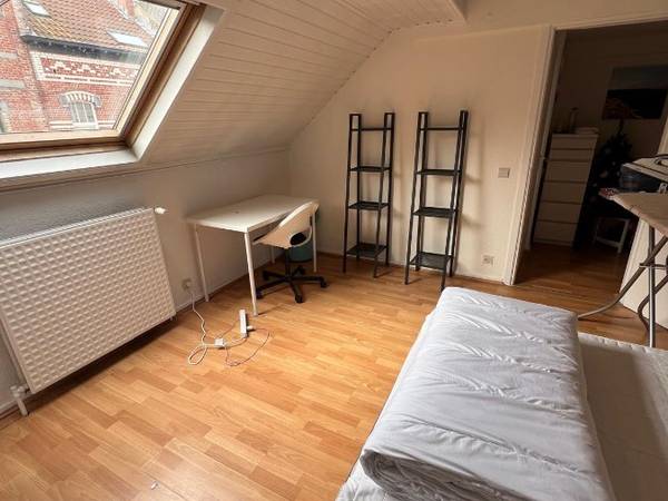 Colocation / Appartement 4 pièces de 80 m², Bruxelles, Rue du Beffroi / Photo 2