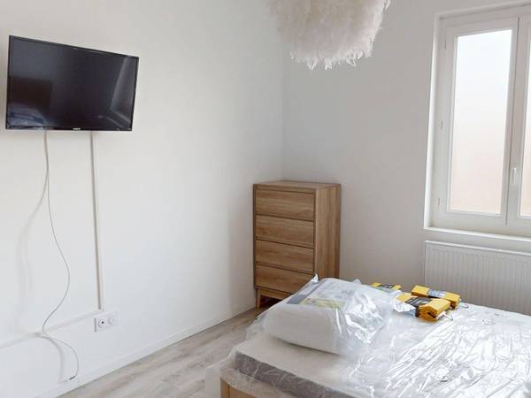 Colocation / Appartement 4 pièces de 86 m², Saint-Étienne, Rue Pierre Et Marie Curie / Photo 2