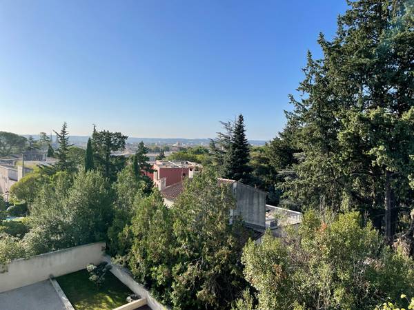 Colocation / Appartement 4 pièces de 100 m², Nîmes, Rue des Trois Fontaines / Photo 4