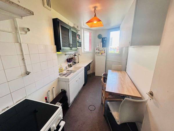 Colocation / Appartement 5 pièces de 83 m², Paris, Rue du Moulin de la Pointe / Photo 2