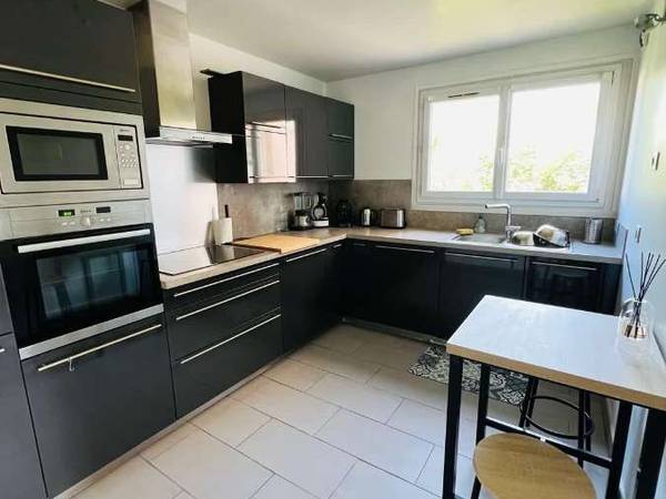 Colocation / Appartement 5 pièces de 113 m², Montigny-le-Bretonneux, Rue des Blés d'Or / Photo 2