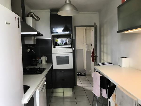 Colocation / Appartement 4 pièces de 83 m², Saint-Martin-d'Hères, Rue Pierre Courtade / Photo 2