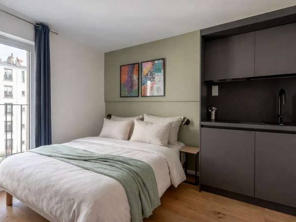 Location / Appartement 1 pièce de 14 m², Paris, Rue Marcadet / Photo 2