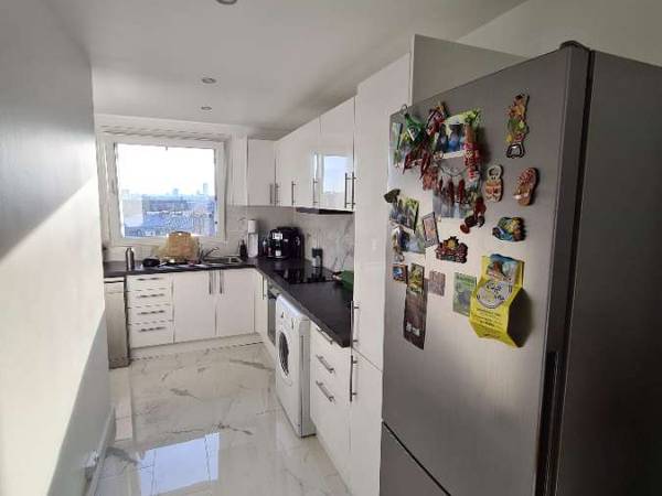 Colocation / Appartement 3 pièces de 70 m², Paris, Rue Léon Frot / Photo 2