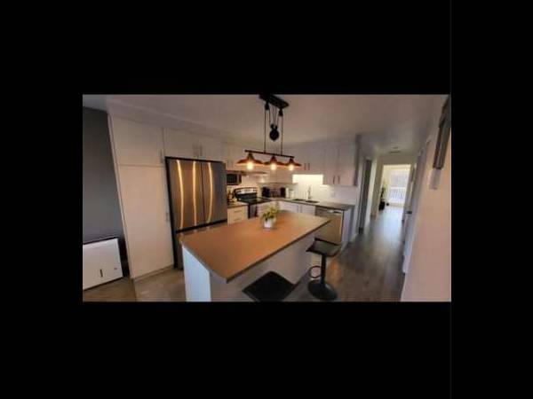 Colocation / Appartement 5 pièces de 20 m², Montréal, 99e Avenue / Photo 2