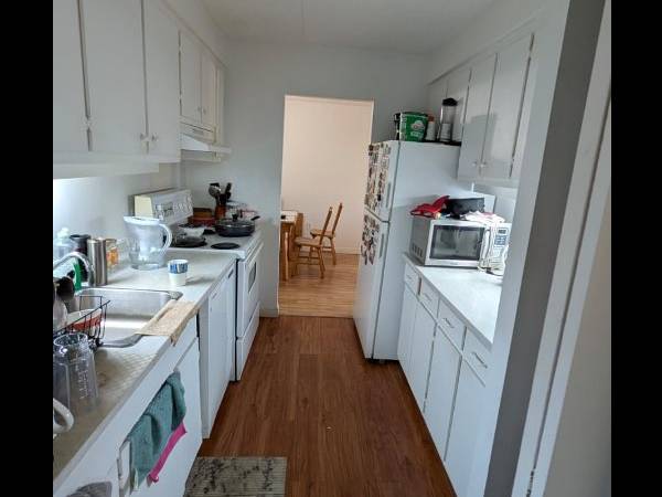 Colocation / Immeuble 3 pièces de 100 m², Longueuil, Rue Saint-Charles Ouest / Photo 5