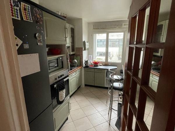 Colocation / Appartement 7 pièces de 125 m², Levallois-Perret, Rue Carnot / Photo 2