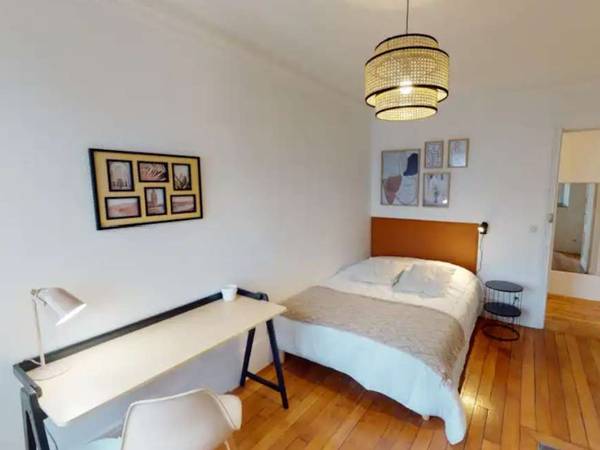 Colocation / Appartement 10 pièces de 150 m², Paris, Rue des Cloÿs / Photo 2