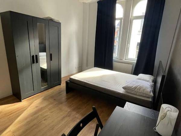 Colocation / Appartement 4 pièces de 128 m², Saint-Gilles, Rue Moris / Photo 2