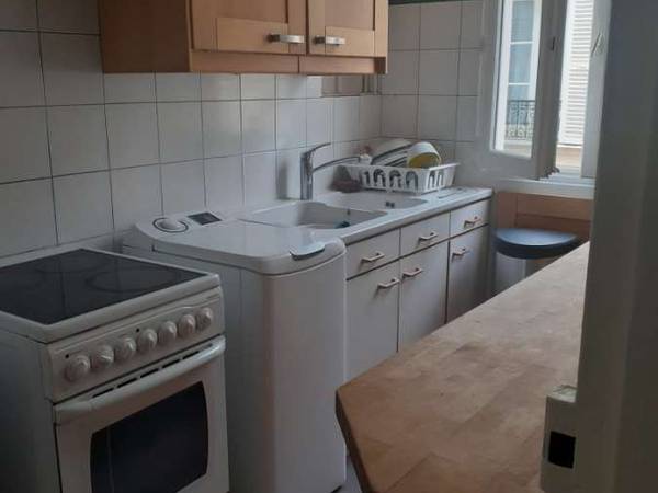 Colocation / Appartement 3 pièces de 52 m², Paris, Rue du Commerce / Photo 2