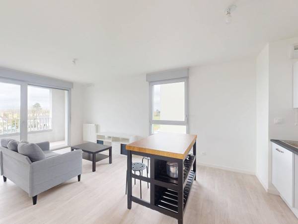 Location / Appartement 3 pièces de 61 m², Colombelles, Rue Jean Jaurès / Photo 2