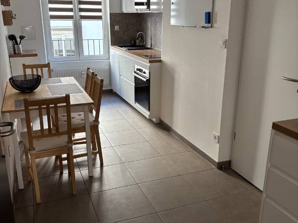 Colocation / Appartement 3 pièces de 66 m², Strasbourg, Rue du Puits / Photo 2