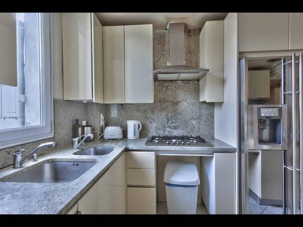 Colocation / Appartement 5 pièces de 90 m², Paris, Rue Manin / Photo 2