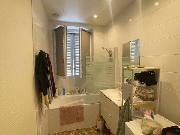 Sous-location / Appartement 6 pièces de 80 m², Paris, Rue Sainte-Isaure / Photo 5