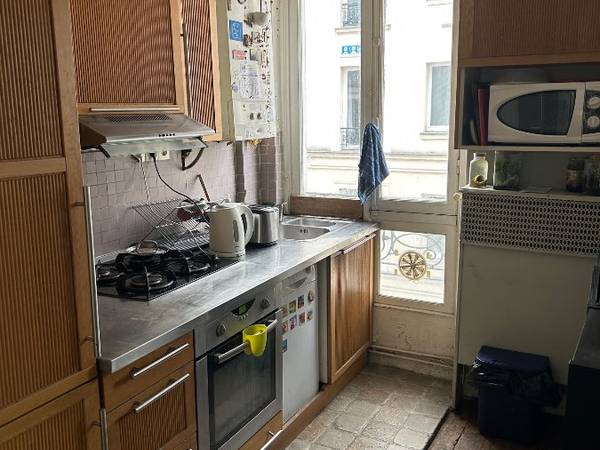 Colocation / Appartement 4 pièces de 70 m², Paris, Rue Feutrier / Photo 2