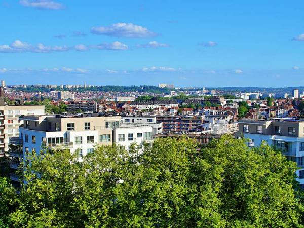 Colocation / Appartement 3 pièces de 128 m², Molenbeek-Saint-Jean, Boulevard Louis Mettewie / Photo 2