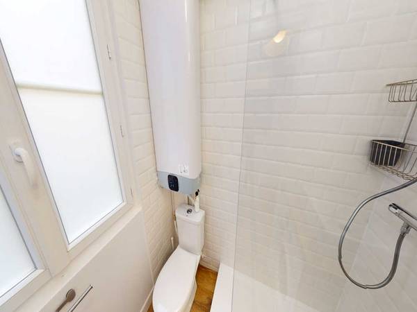 Colocation / Appartement 9 pièces de 150 m², Paris, Rue des Cloys / Photo 14