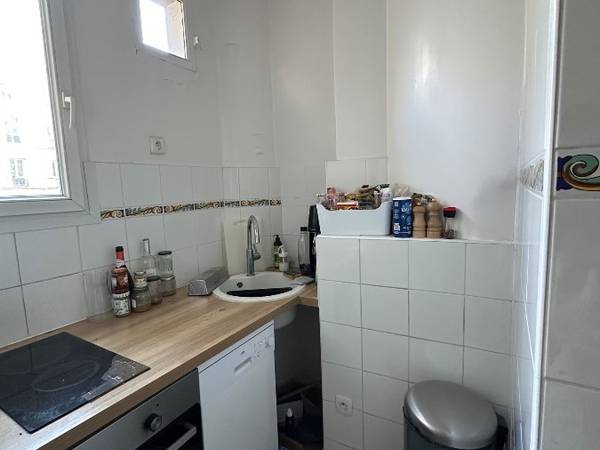 Colocation / Appartement 3 pièces de 50 m², Paris, Rue la Condamine / Photo 2