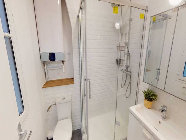 Colocation / Appartement 6 pièces de 100 m², Paris, Rue des Cloys / Photo 9