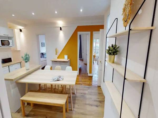 Colocation / Appartement 10 pièces de 150 m², Paris, Rue des Cloys / Photo 12