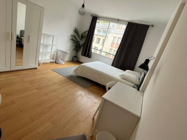Colocation / Appartement 7 pièces de 150 m², Paris, Rue Léonard de Vinci / Photo 2