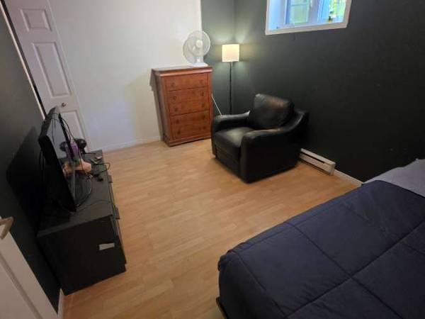 Room share / 6 rooms house · 1234 m², Lévis, Rue du Convoi / Photo 2